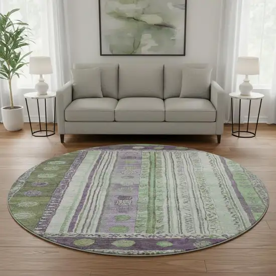 8' Purple Green And Ivory Striped Washable Round Rug With UV Protection Photo 2