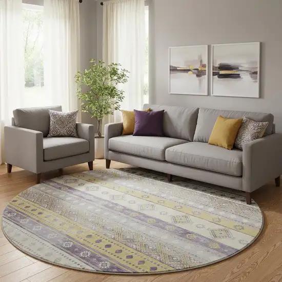 8' Purple Ivory And Gold Tribal Washable Round Rug With UV Protection Photo 1