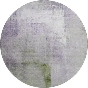 Photo of 8' Purple Ivory And Green Abstract Washable Round Rug With UV Protection