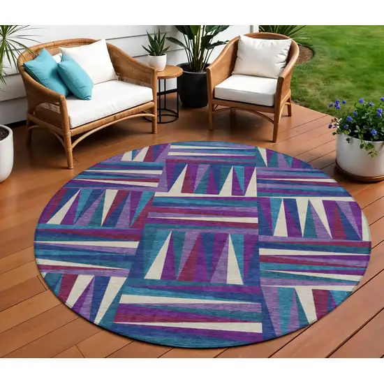 8' Purple Ivory And Teal Blue Round Geometric Washable Indoor Outdoor Area Rug Photo 1