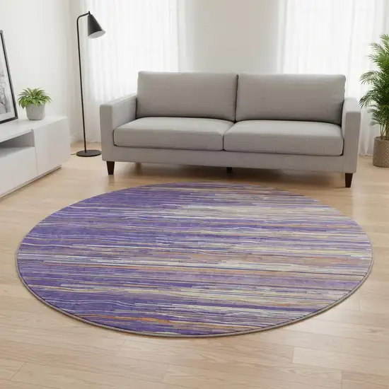 8' Purple Orange And Ivory Striped Washable Round Rug With UV Protection Photo 2