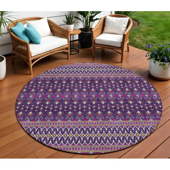 8' Purple Pink And Yellow Round Tribal Washable Indoor Outdoor Area Rug Photo 1