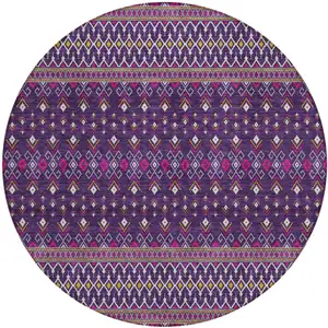 Photo of 8' Purple Pink And Yellow Round Tribal Washable Indoor Outdoor Area Rug