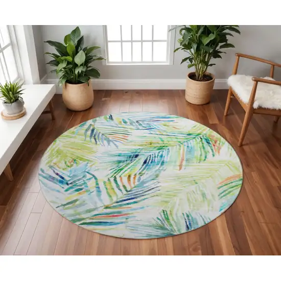 8' Rainbow And Ivory Geometric Washable Round Rug With UV Protection Photo 1