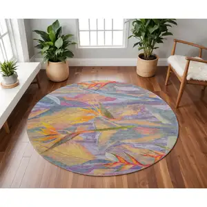 Photo of 8' Rainbow And Ivory Geometric Washable Round Rug With UV Protection