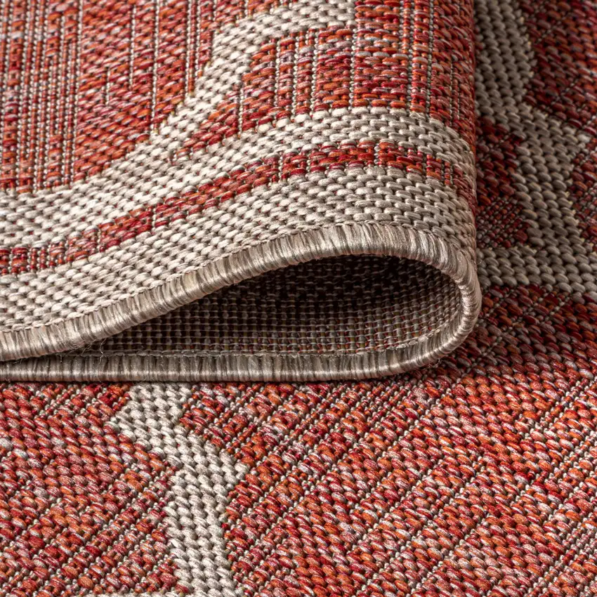 6' Red And Beige Round Geometric Indoor Outdoor Area Rug Photo 7