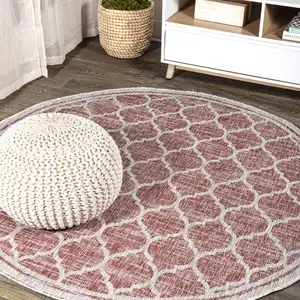 Photo of 6' Red And Beige Round Geometric Indoor Outdoor Area Rug