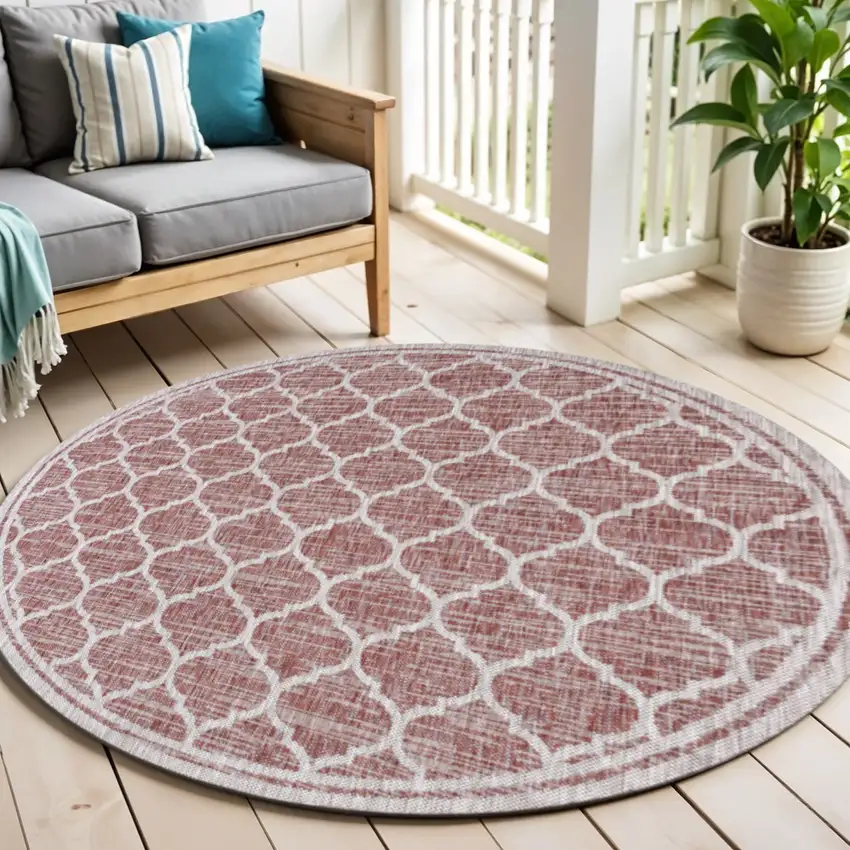 6' Red And Beige Round Geometric Indoor Outdoor Area Rug Photo 1