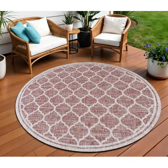 8' Red And Beige Round Geometric Indoor Outdoor Area Rug Photo 1