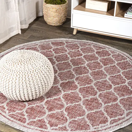 8' Red And Beige Round Geometric Indoor Outdoor Area Rug Photo 4