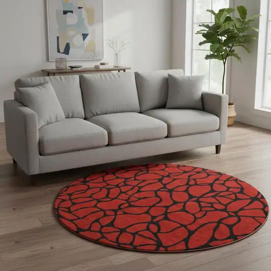 8' Red And Black Geometric Washable Round Rug With UV Protection Photo 2