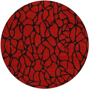 Photo of 8' Red And Black Round Geometric Washable Indoor Outdoor Area Rug