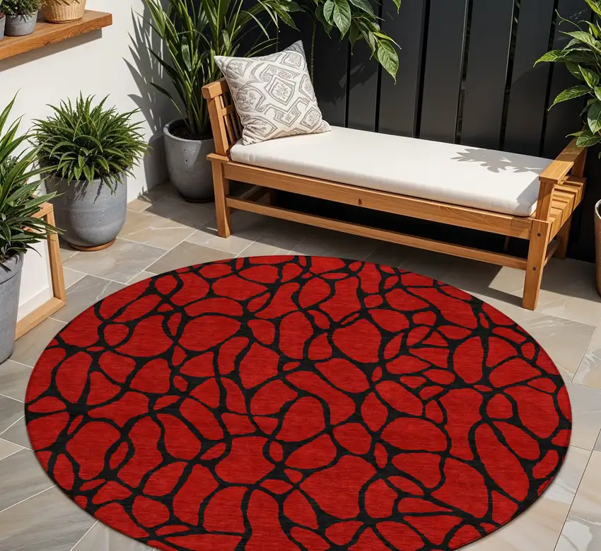 8' Red And Black Round Geometric Washable Indoor Outdoor Area Rug Photo 1