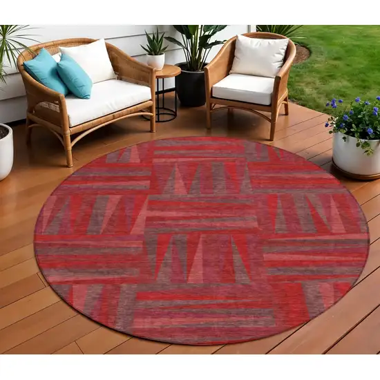8' Red And Brown Round Geometric Washable Indoor Outdoor Area Rug Photo 1