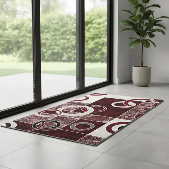 7' Red And Gray Geometric Runner Rug Photo 1