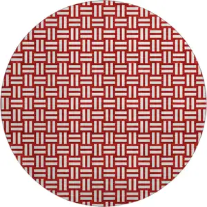 Photo of 8' Red And Ivory Abstract Geometric Washable Round Rug With UV Protection