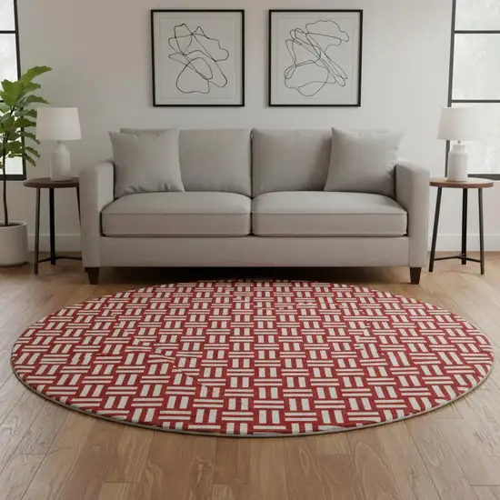 8' Red And Ivory Abstract Geometric Washable Round Rug With UV Protection Photo 2