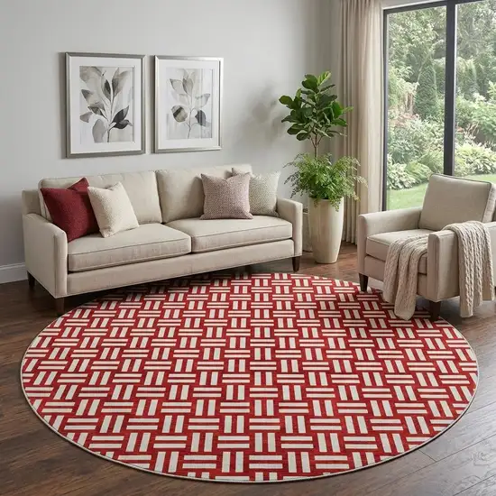 8' Red And Ivory Abstract Geometric Washable Round Rug With UV Protection Photo 1