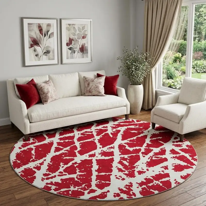 8' Red And Ivory Abstract Washable Round Rug With UV Protection Photo 1