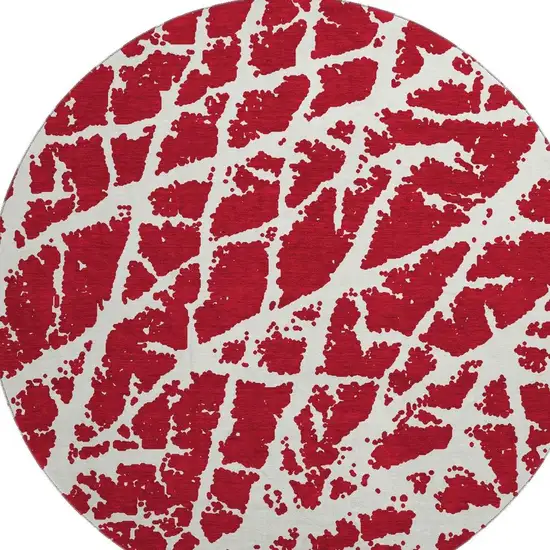 8' Red And Ivory Abstract Washable Round Rug With UV Protection Photo 3