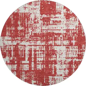Photo of 8' Red And Ivory Abstract Washable Round Rug With UV Protection
