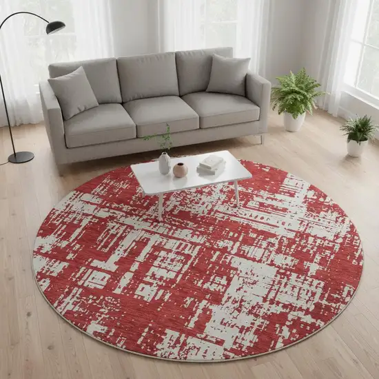 8' Red And Ivory Abstract Washable Round Rug With UV Protection Photo 2