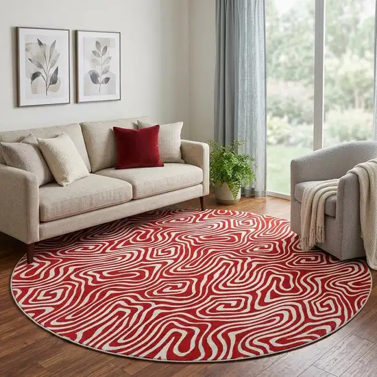 8' Red And Ivory Abstract Washable Round Rug With UV Protection Photo 1