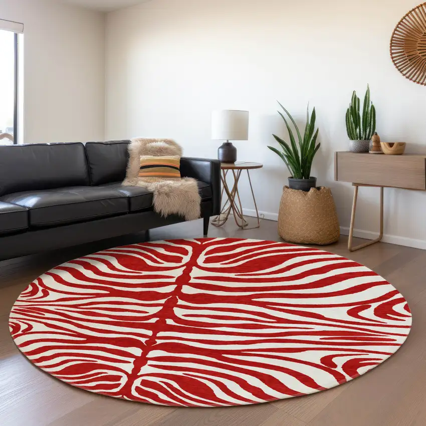 8' Red And Ivory Animal Print Washable Round Rug With UV Protection Photo 3