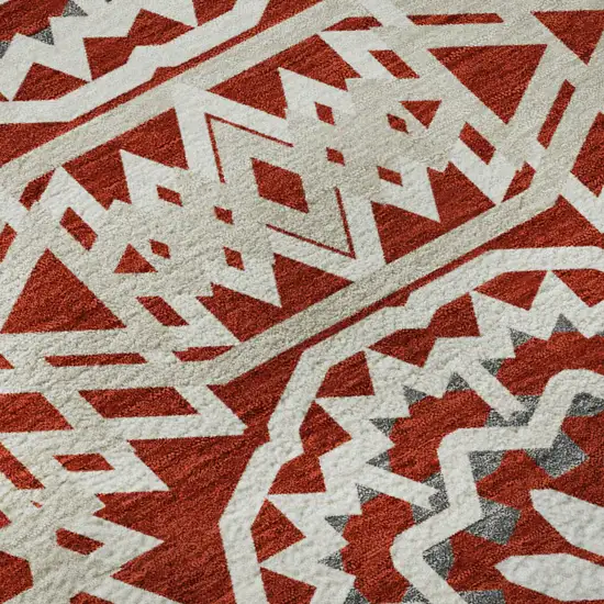 8' Red And Ivory Geometric Washable Round Rug With UV Protection Photo 9