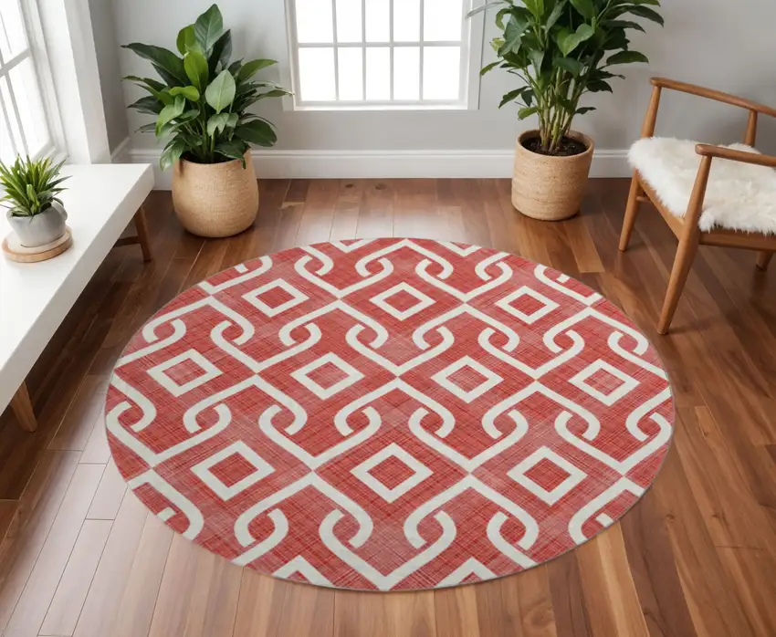 8' Red And Ivory Geometric Washable Round Rug With UV Protection Photo 2