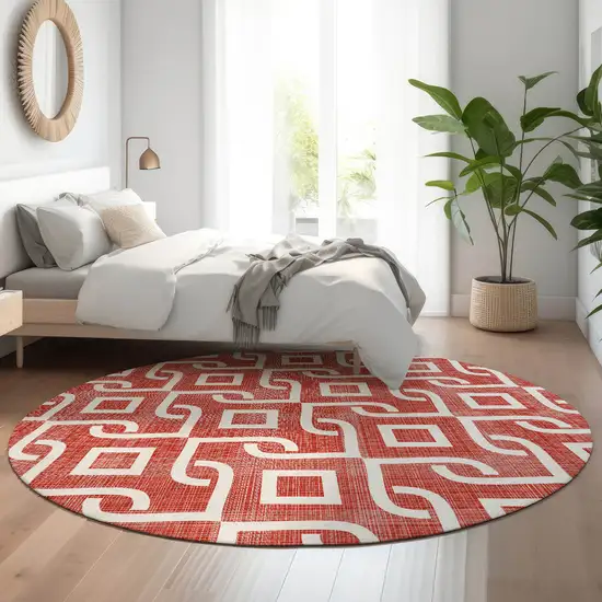 8' Red And Ivory Geometric Washable Round Rug With UV Protection Photo 5