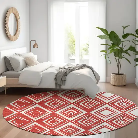 8' Red And Ivory Geometric Washable Round Rug With UV Protection Photo 6