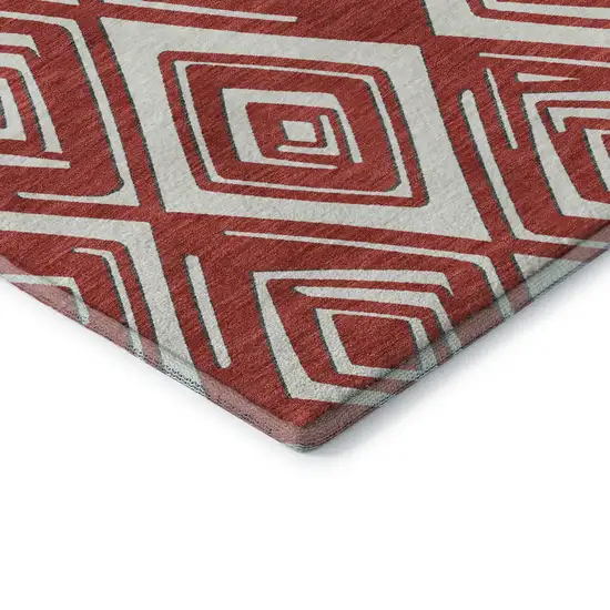8' Red And Ivory Geometric Washable Round Rug With UV Protection Photo 8