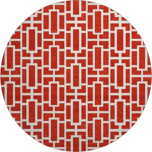 Photo of 8' Red And Ivory Geometric Washable Round Rug With UV Protection