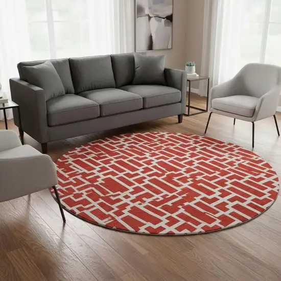 8' Red And Ivory Geometric Washable Round Rug With UV Protection Photo 2