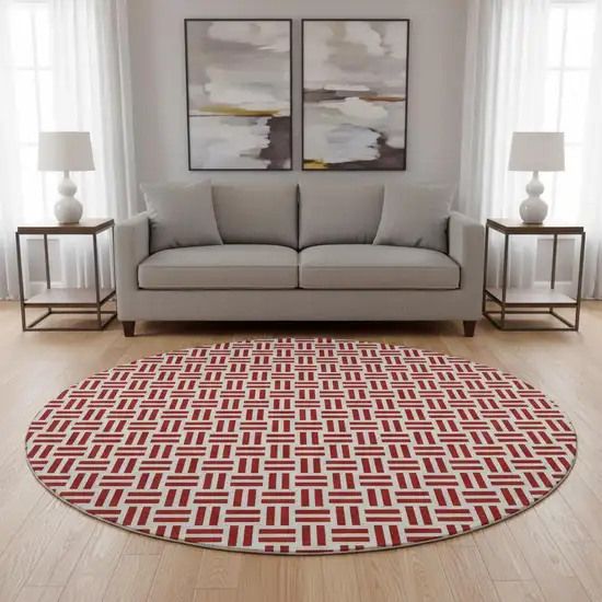8' Red And Ivory Geometric Washable Round Rug With UV Protection Photo 2
