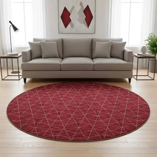 8' Red And Ivory Geometric Washable Round Rug With UV Protection Photo 2
