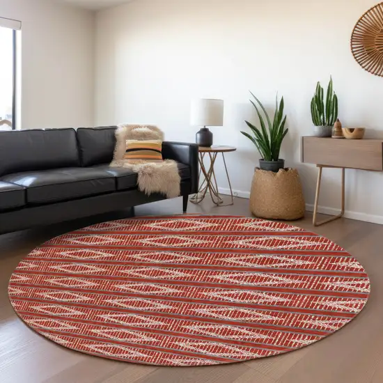 8' Red And Ivory Geometric Washable Round Rug With UV Protection Photo 3