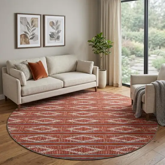 8' Red And Ivory Geometric Washable Round Rug With UV Protection Photo 1