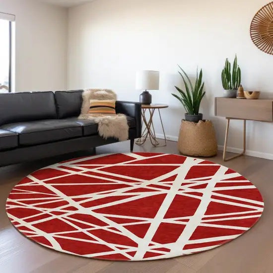 8' Red And Ivory Geometric Washable Round Rug With UV Protection Photo 4