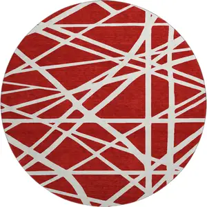 Photo of 8' Red And Ivory Geometric Washable Round Rug With UV Protection