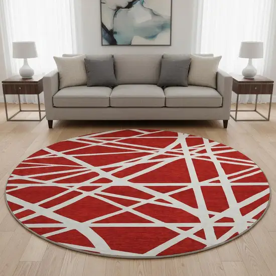 8' Red And Ivory Geometric Washable Round Rug With UV Protection Photo 2