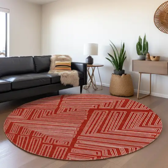 8' Red And Ivory Geometric Washable Round Rug With UV Protection Photo 4