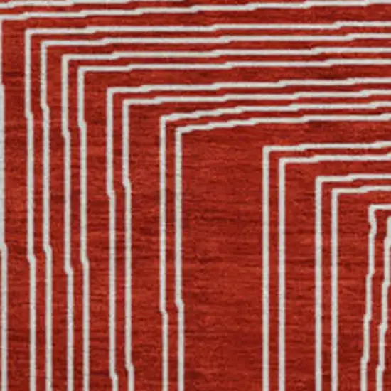 8' Red And Ivory Geometric Washable Round Rug With UV Protection Photo 2