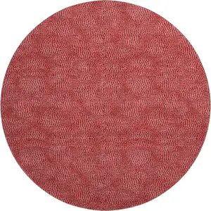 Photo of 8' Red And Ivory Geometric Washable Round Rug With UV Protection