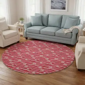 Photo of 8' Red And Ivory Nautical Washable Round Rug With UV Protection