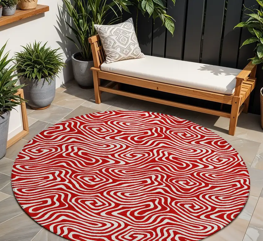 8' Red And Ivory Round Abstract Washable Indoor Outdoor Area Rug Photo 1