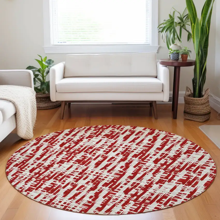8' Red And Ivory Round Abstract Washable Indoor Outdoor Area Rug Photo 9