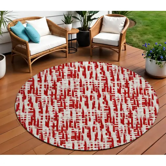 8' Red And Ivory Round Abstract Washable Indoor Outdoor Area Rug Photo 1