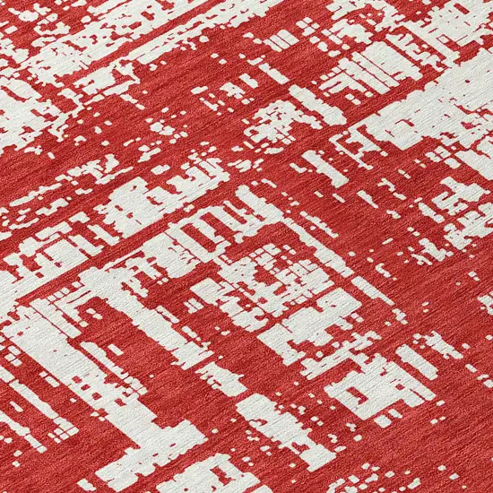 8' Red And Ivory Round Abstract Washable Indoor Outdoor Area Rug Photo 8